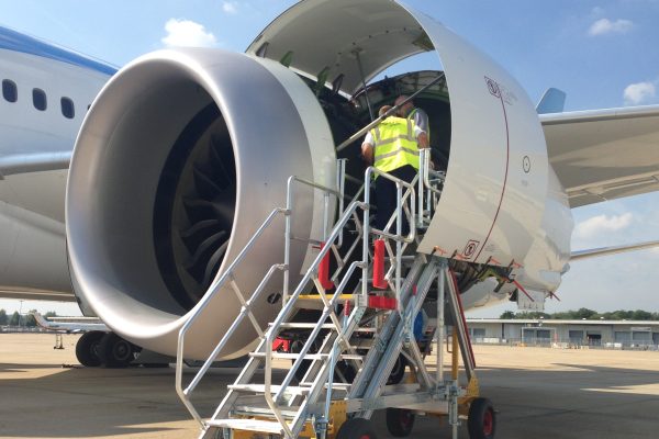 Technician using access platform